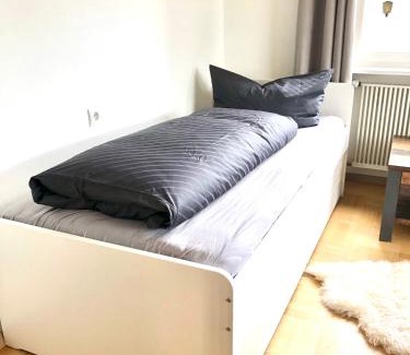 Mader Apartment | CROWN LIVING Design Apartment - 2 Schlafzimmer - Küche - gratis Parkplatz - Abstellraum für Fahrräder/Ski