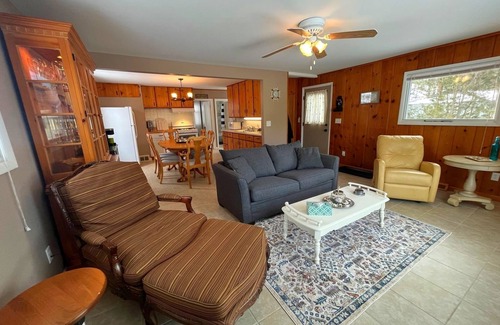 Ludington Cottage | Cutest cottage on Hamlin Lake. Lake views!