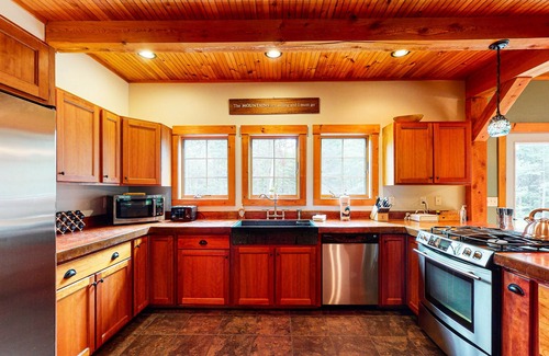 Kingfield House | Dazzling dog-friendly lodge with stunning views, game room, firepit & W/D