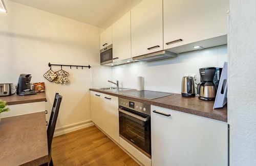 Dorumer Neufeld Apartment | De Wisch - Newly renovated vacation apartment with pool and sauna