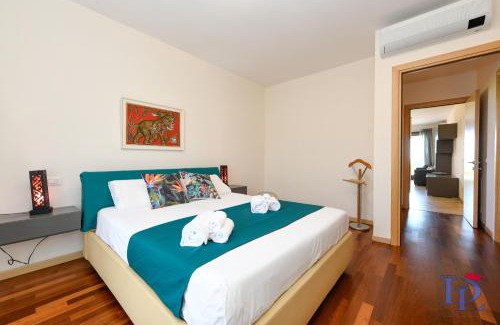Rivoltella Apartment | DesenzanoLoft Official Partner Homes & Villas by Marriott Bonvoy - Co2 apartment in Residence Vistalago with 5 pools
