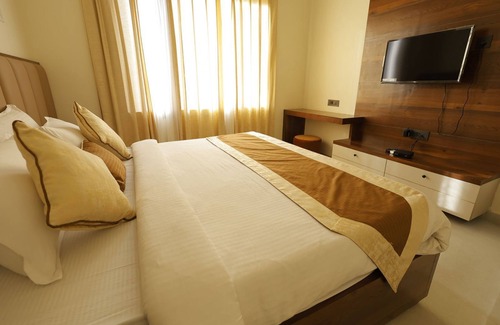 Golaghat Hotel | Dhanshree Resort