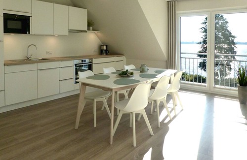 Klein Wittensee Apartment | Direct lakeside location, fantastic lake view, balcony, Baltic Sea 12 km, barrel sauna, balcony