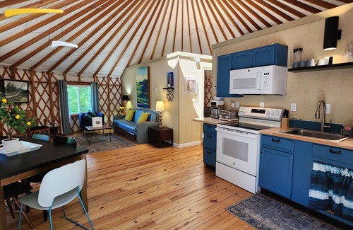 Mill Spring House | Dog friendly 30' Yurt, large dome skylight, king bed, 2 bedrooms, sleeps 6.