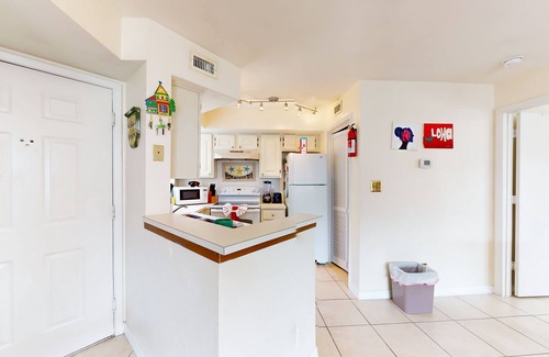 Ocean Side Village Condo | Dog-friendly condo near the beach with outdoor pool, hot tub, gym, balcony, W/D