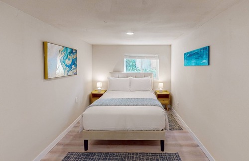 Shoreline House | Dog-friendly lake view home with kitchen & kitchenette, patio, sunroom