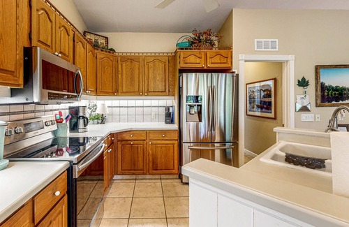 Bell House | Dog-friendly riverfront home - screened porch, 2 private docks, boat ramp access