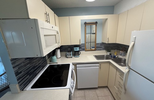 Dam Neck Apartment | Dolphin Beach condo with indoor pool, ocean views, steps to the beach