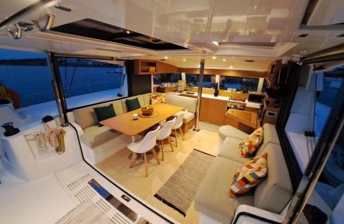 Vallpineda Boat Rental | Dortoka Catamarán
