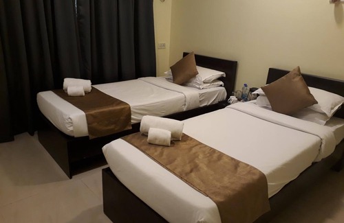 J B Nagar Hotel | Dragonfly Apartments Emerald