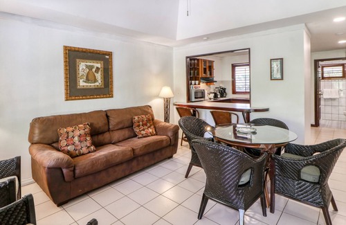 Damas Apartment | Dreamy tropical gem with pool, lush gardens, private patio, & WiFi
