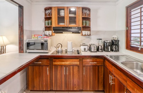Damas Apartment | Dreamy tropical gem with pool, lush gardens, private patio, & WiFi