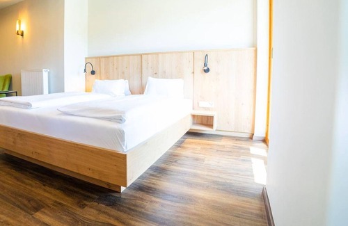 Altfinkenstein House | Dreibettzimmer Superior - Finkensteiner Hof, Dion Hotels & Resorts Gmbh