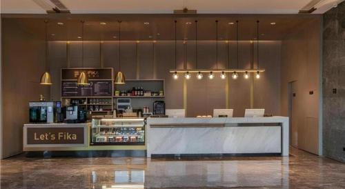 Jiangxia District Hotel | Echarm Plus Hotel Wuhan Wenhua Boulevard Dahualing Subway Statiom