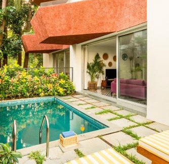 Nerul Apartment | El Volar 2BHK Luxury Apartments 10 Minutes from Candolim Beach with Big common Pool, Fully Equipped Kitchen, 24x7 Security, Wifi