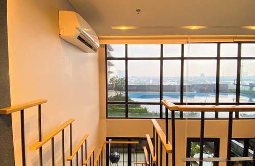 Pinang Apartment | Elegant 2BR Loft Garden Villa at Collins Boulevard Apartment