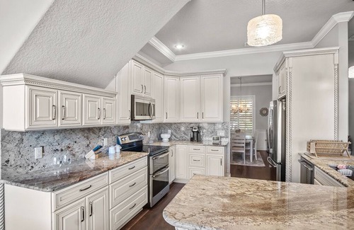 Nichols House | Elegant home with office, theater and heated pool