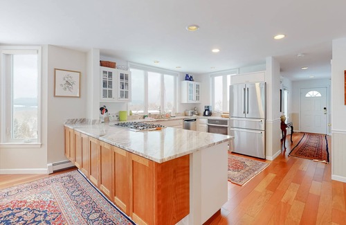 Waterbury Center House | Elegant & renewed mountain-view home with private hot tub, large deck & backyard