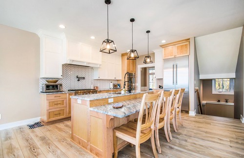 Riverside House | Enchanting lakefront home with pool, hot tub, firepit, game room, & washer/dryer