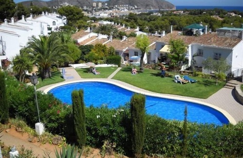 Pinar del Advocat House | End bungalow, sea view, communal pool, internet, smart TV, air conditioning, winter offers