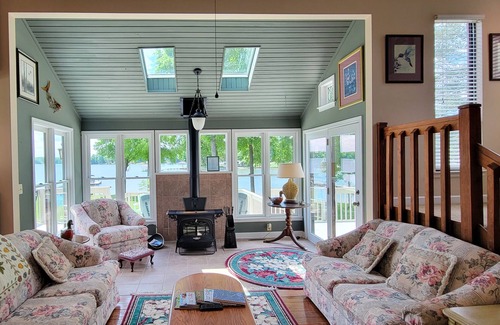 Troutman House | Enjoy the beauty of lake life in this waterfront home .