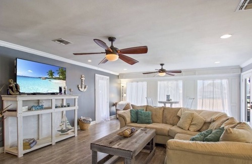 New Orleans East Area House | Enjoy this serene waterfront getaway with boat dock and deck.