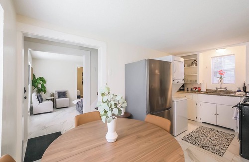 Shady Acres House | Enjoy two separate, fully furnished homes on one property — perfect for large groups. The front home offers 3 bedrooms and 1 bath, while the back two-story home features 3 bedrooms, 2 baths, and an upstairs family room with 2 beds