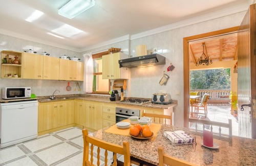 Lluc House | ES VINT I NOU - Beautiful house with great terrace amidst the mountains.