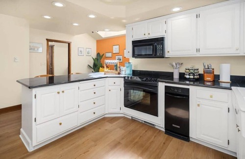 Maple Heights-Lake Desire House | European White Castle on Lake Desire | Private Dock