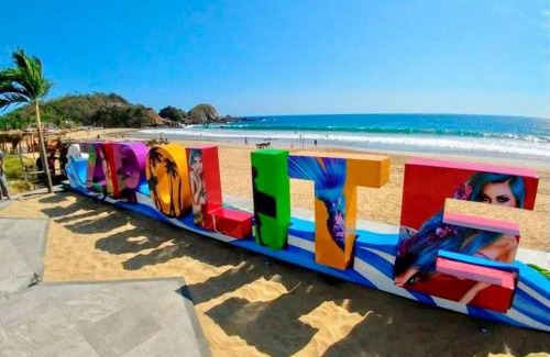 Puerto Angel Villa | Exclusivo Bungalow frente a la playa, alberca nueva con vista infinita al mar, 8 hermosas playas cercanas, terraza con cama de playa y espectacular vista al océano pacífico! Nómadas digitales Starlink WiFi 203 mbps