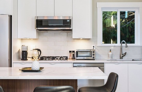 Crescent Beach Apartment | Executive Suite! Luxurious space w/private deck. Stroll to shops & restaurants.
