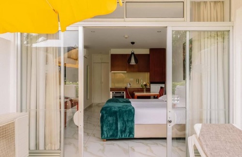 Oura Hotel | Exotic Coastal Retreat! Easy Beach Access on a Terrace Room | 3 Units