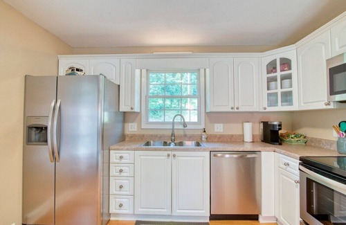 Johnson City House | Experience the serenity of a peaceful neighborhood and the excitement of the city .