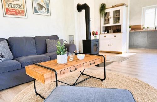 Grundhof House | Fördezauber - Ruhiges Ferienhaus mit eingezäuntem Garten und Kamin