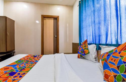 Prahlad Nagar Hotel | FabExpress Relax Inn - Nr Sarkhej - Gandhinagar Highway