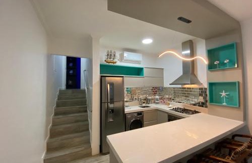Riviera de Sao Lourenco Apartment | Fabuloso flat 243 Amarílis 2 piscinas climatizadas, carregador veiculo elétrico Riviera de São Lourenço, Bertioga Apartamento Duplex inteiro, cozinha equipada completa, serviço de praia, limpeza e trocas diária de toalhas, wi-fi 500mb