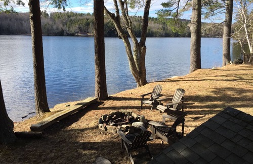 Winthrop Apartment | Fall colors at a Maine Lakefront cottage. Watch the beautiful change of seasons
