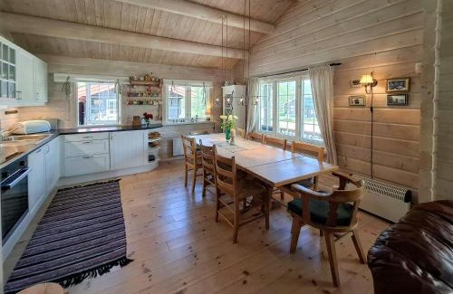 Bjorli House | Family Cabin Cluster By Waterfall In Bjorli