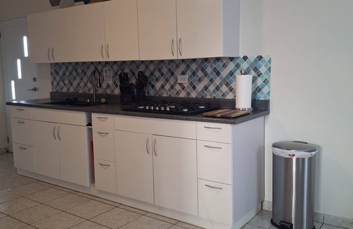Jobos House | Family-Friendly 2BR in Isabela—AC in Every Room & Kid Essentials Near Beaches