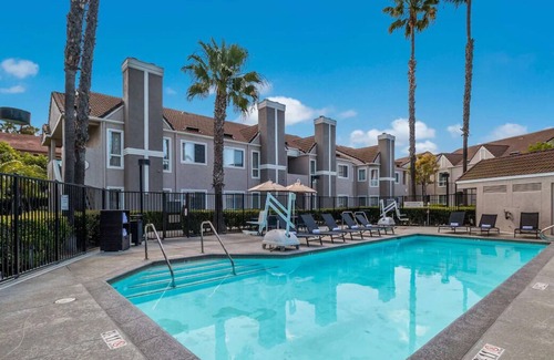 Downtown Village House | Family Fun at Newport Beach! w/ Full Kitchen, Onsite Pool & Sports Facility!
