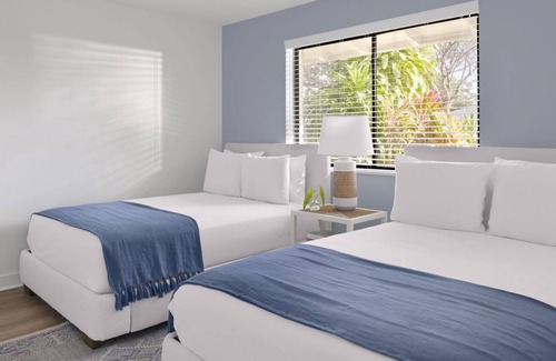Hunt Club Hotel | Family Oasis with Tennis, Pickleball, and Resort Pools at PGA National