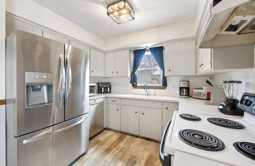 North Central Omaha House | Family-sized home with outdoor pool and deck