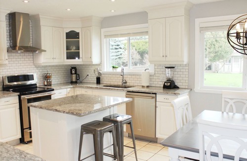 Crawford House | Family Vacation Oasis: Heated Pool, 5 bedrooms, 1/2 acre property, covered patio