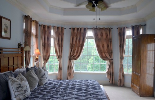 Suwanee Other | Farm Style home with a pool and game room to stretch out and have family fun.