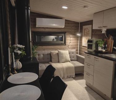 Lampivaara House | Fell Village 4 with a Mountain View, Fireplace, Sauna, Kitchen