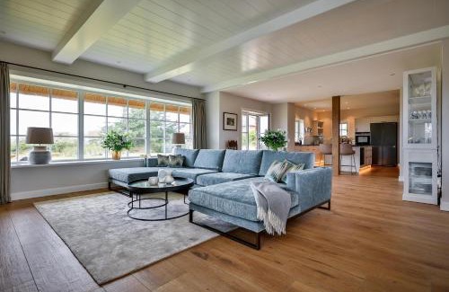 List House | Ferienhaus One Sylt - Traumhaus unter Reet, zwischen Wattenmeer und Nordsee