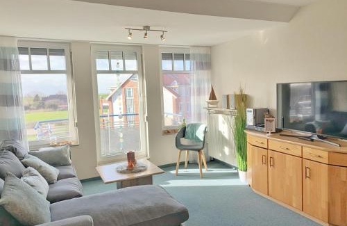 Dorumer Neufeld Apartment | Ferienwohnung dat Stürboord mit Schwimmbad und Sauna