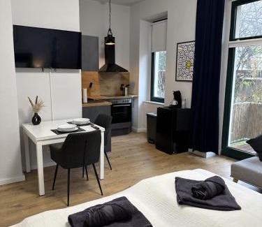 Nordfront Apartment | Ferienwohnung Lorenz mit kostenlosem Parkplatz Netflix Boxspringbett Küche