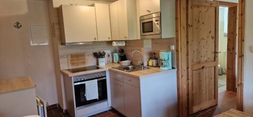 Kronsgaard Apartment | Ferienwohnung 'Nieby' - Refugium Pottloch Ostsee