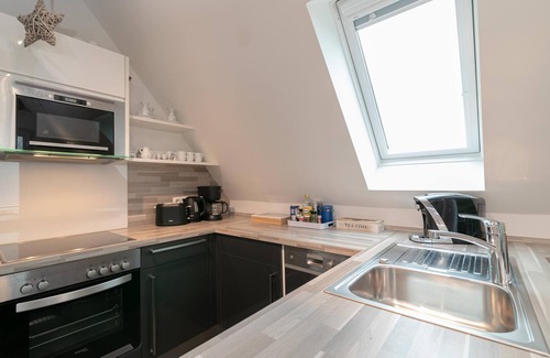 Lutt Kiepenbarg Apartment | Ferienwohnung Sommerwind mit Balkon in Scharbeutz